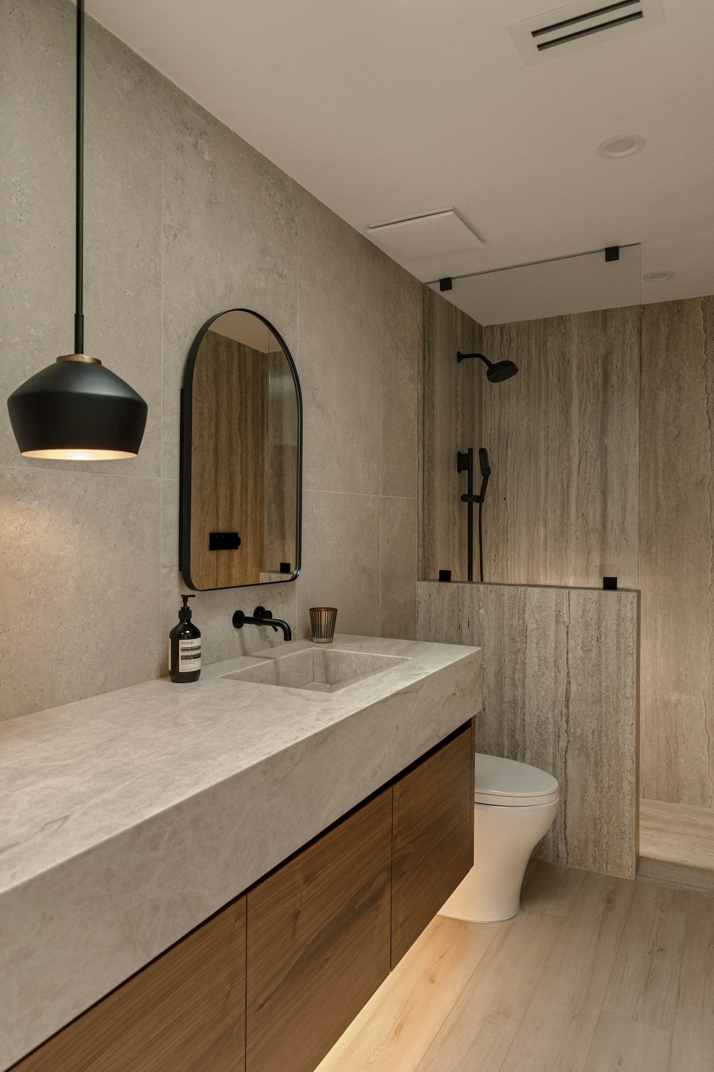 Contemporary bathroom with elegant finishes and natural light